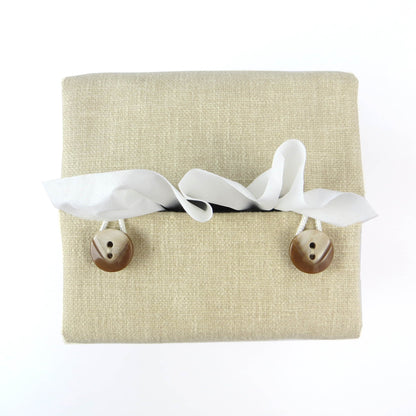 Top view of square tissue box cover with buttons