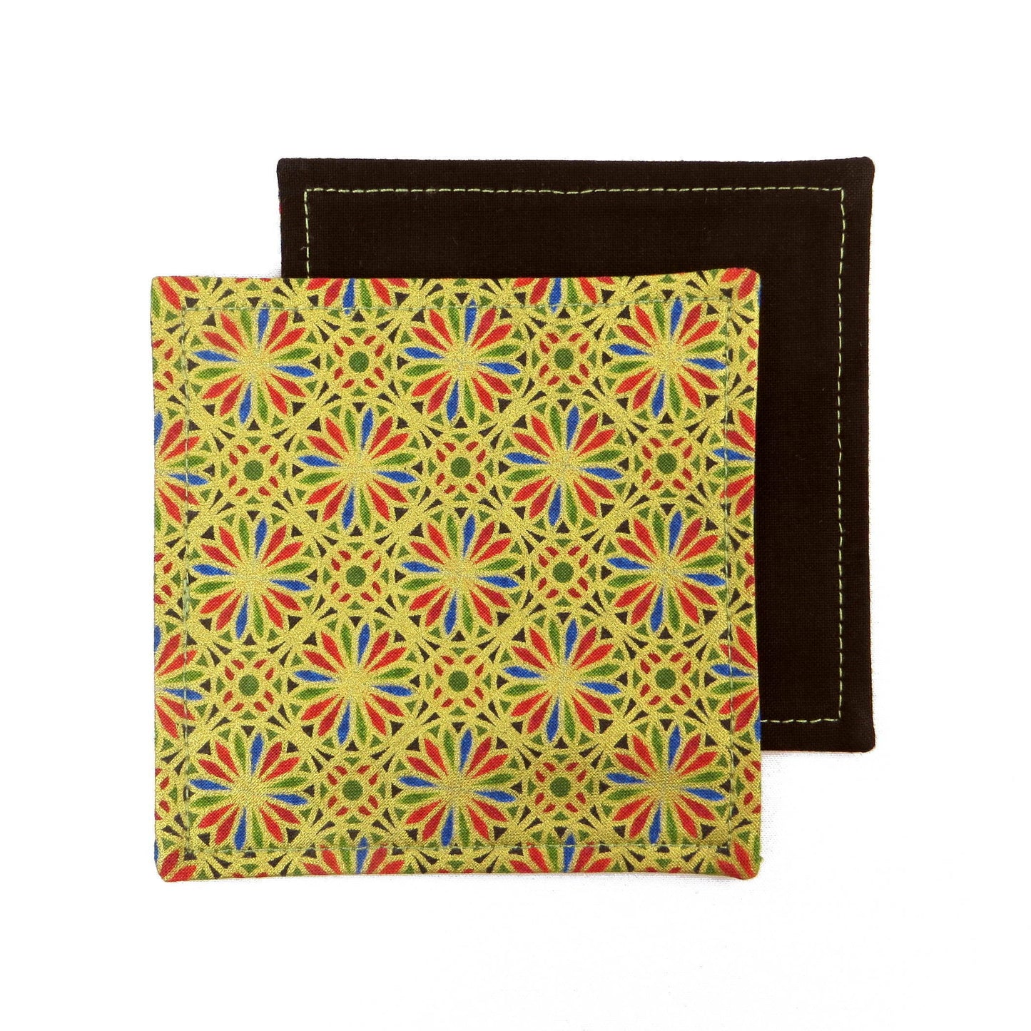 Square coasters with holiday themed blue, red, and green petals, with metallic gold accent