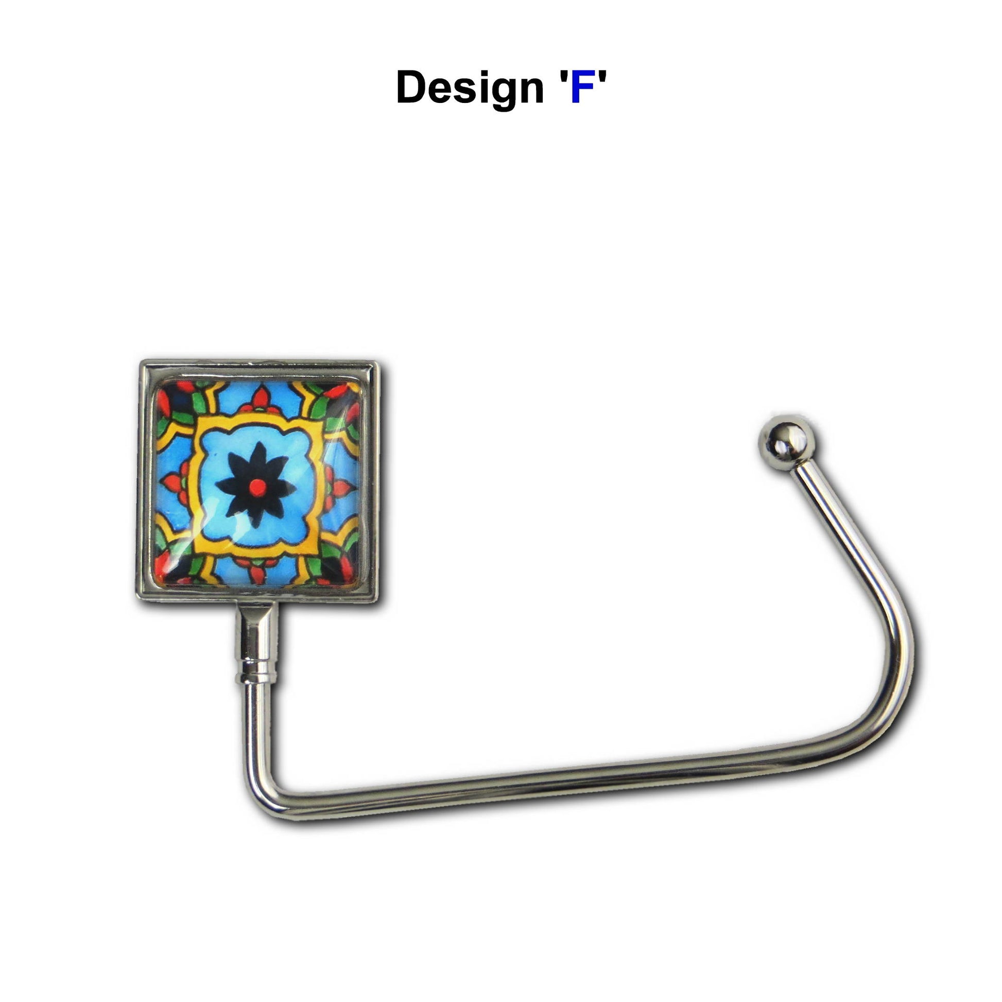 Handbag hook with a glass domed blue, yellow, and red tile image