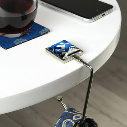 Handbag hook for hanging accessories on tables, ledges, and shelves