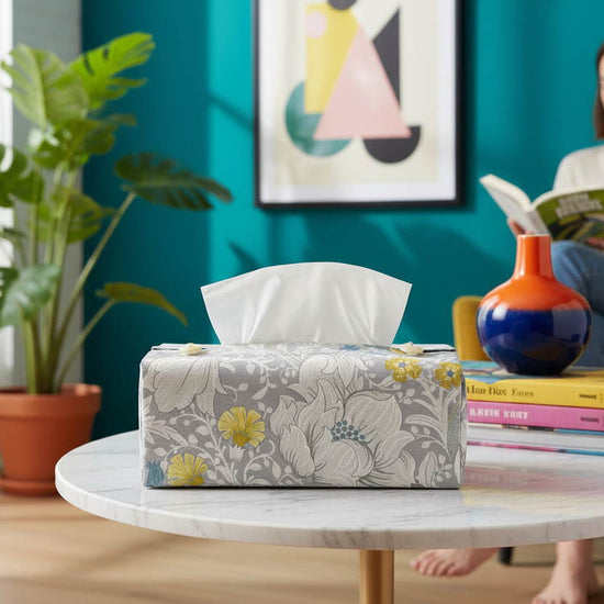 Handmade tissue box covers with a grey and white magnolia flower design displayed in a bedroom and living room