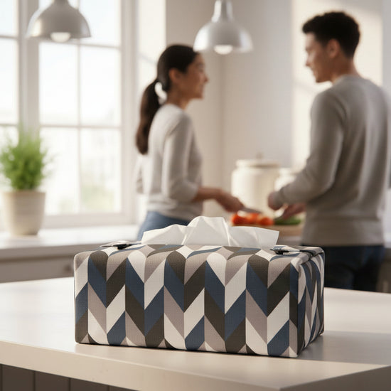 Handmade tissue box cover with a blue, white, and grey herringbone design displayed in a bedroom and kitchen