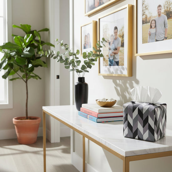 Handmade tissue box cover with grey, white, and black herringbone design displayed in a hallway