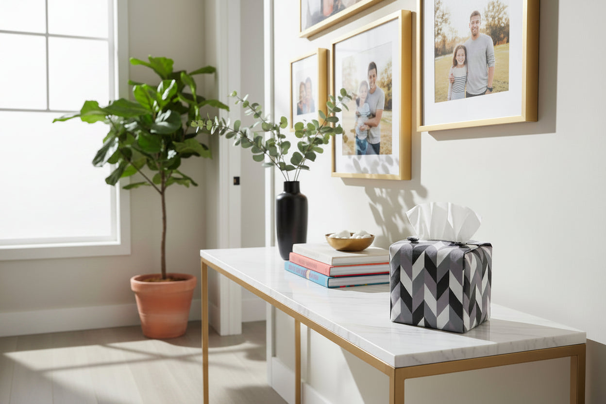 Handmade tissue box cover with grey, white, and black herringbone design displayed in a hallway