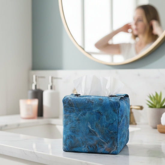 Handmade fabric tissue box covers with dark blue abstract design displayed in a hallway and living room