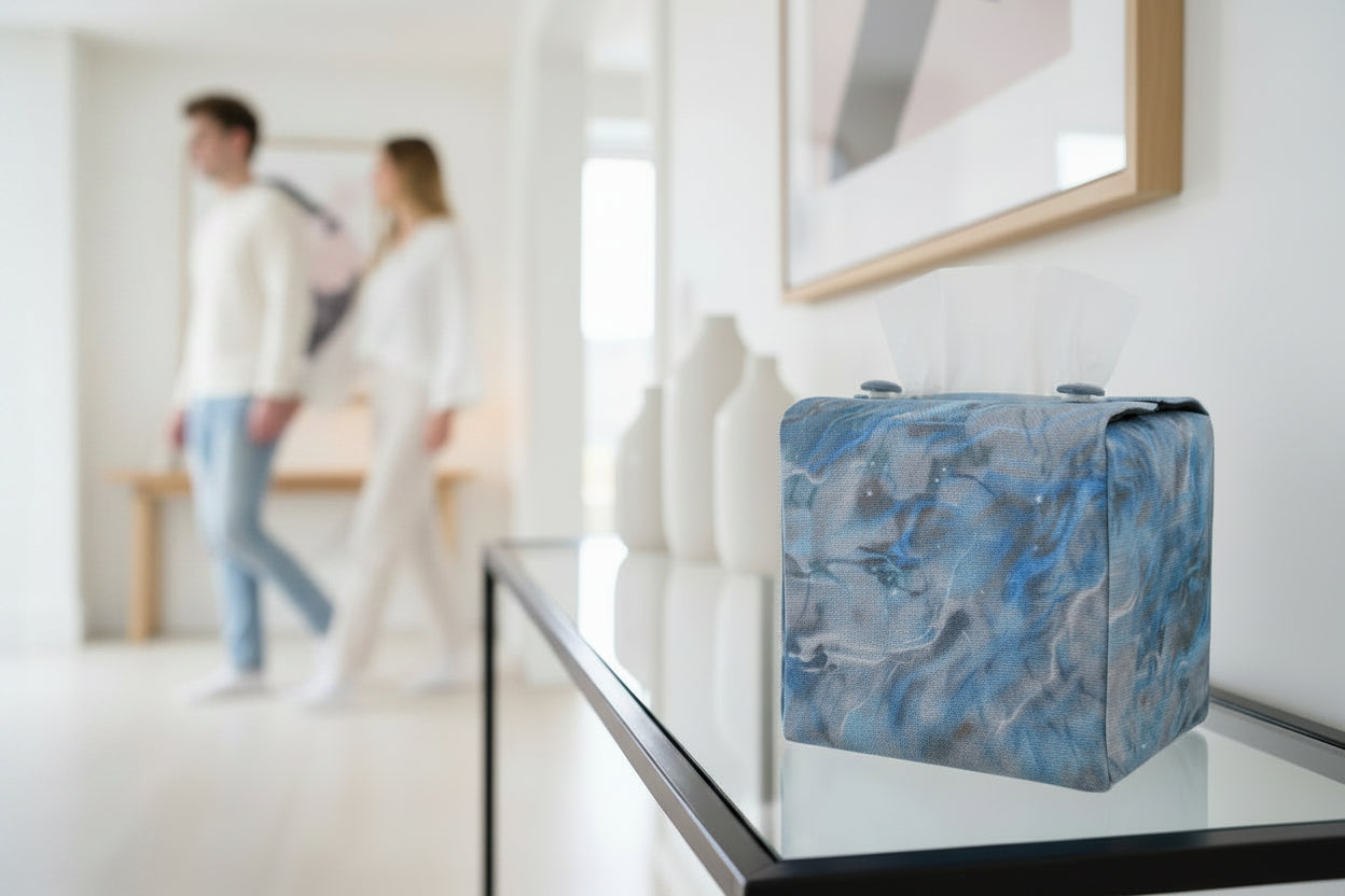 Handmade fabric tissue box covers with light blue abstract design displayed in a hallway and living room