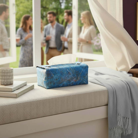 Handmade fabric tissue box covers with dark blue abstract design displayed in a hallway and living room