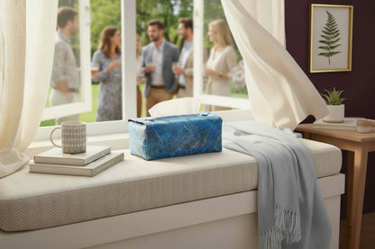 Handmade fabric tissue box covers with dark blue abstract design displayed in a hallway and living room