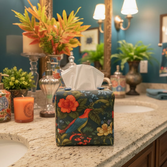 Tissue box cover with colourful birds and floral design displayed in a bathroom and living room