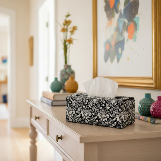 Tissue box cover with black and white floral design displayed in a bedroom and hallway