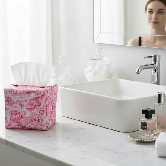 Tissue box cover with soft pink roses design displayed in a bathroom and hallway