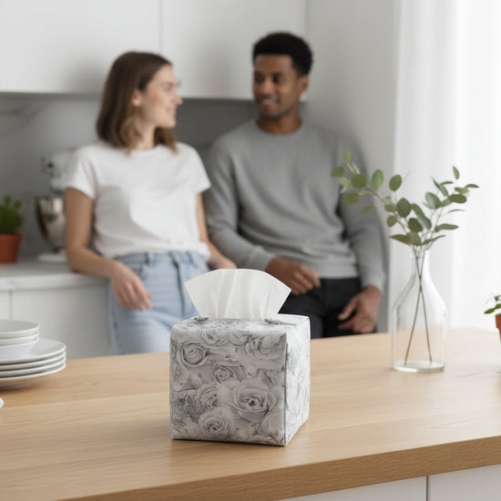 Tissue box cover with soft grey roses design displayed in a kitchen and living room