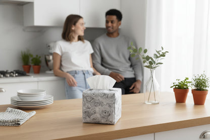 Tissue box cover with soft grey roses design displayed in a kitchen and living room