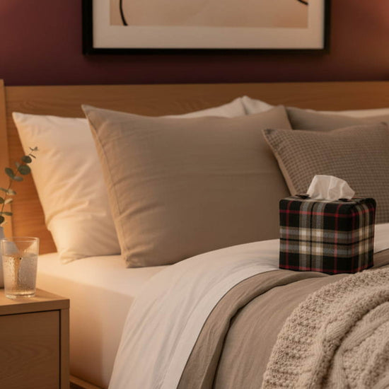 Tissue box cover in brushed cotton fabric with a black, tan, and red tartan design displayed in a bedroom and hallway