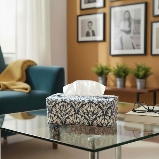 Blue tissue box cover with leaf design displayed in a bathroom and living room