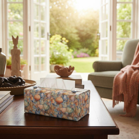 Tissue box cover with seashells pattern displayed in a bathroom and living room