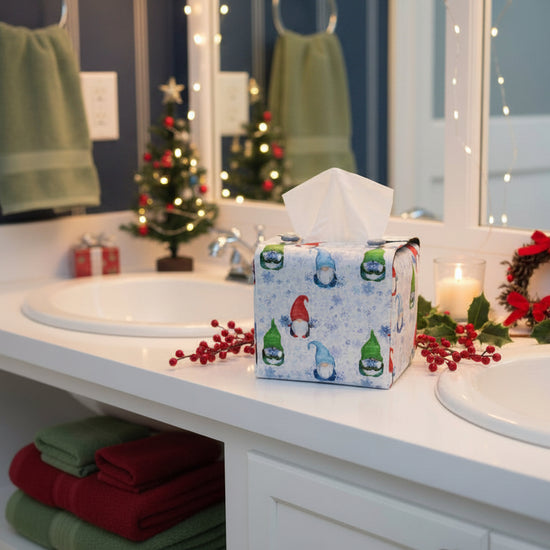 Tissue box cover with colourful gnomes and snowflakes design displayed in a bathroom and living room