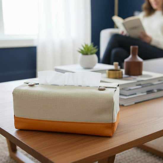 Handmade tissue box covers with a two tone beige and orange design displayed in a bedroom and kitchen